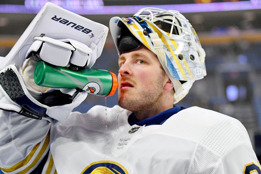 Sabres prospect Ullmark proves his new wife is a keeper with the greatest  wedding photo - Article - Bardown
